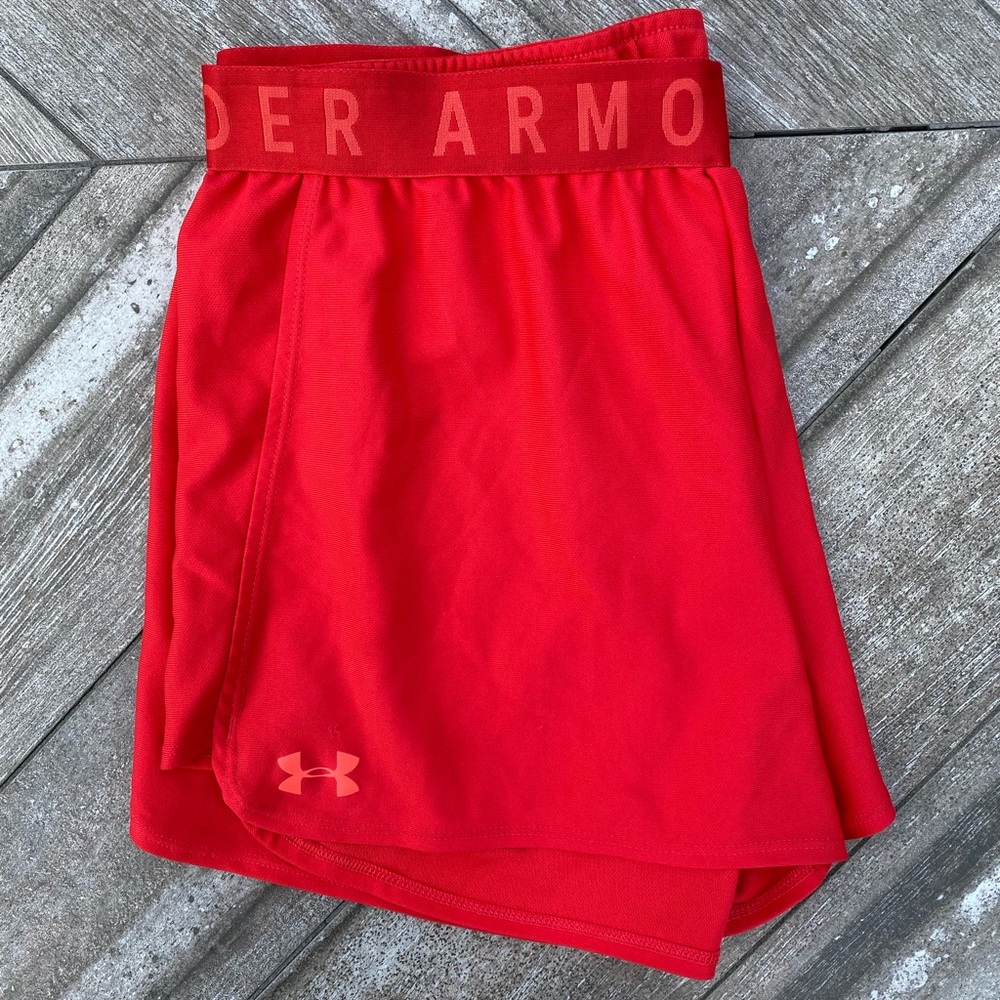 Under Armour heat gear size L shorts, loose fit, bright orange-red color